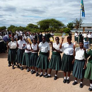 Thanks VIU! Secondary students showing the books donated by VIU (Departments of Anthropology, English, and Geography, and field school student).