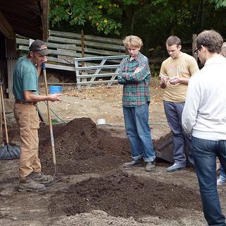 Visit to a farm in Cedar Learning about composting.